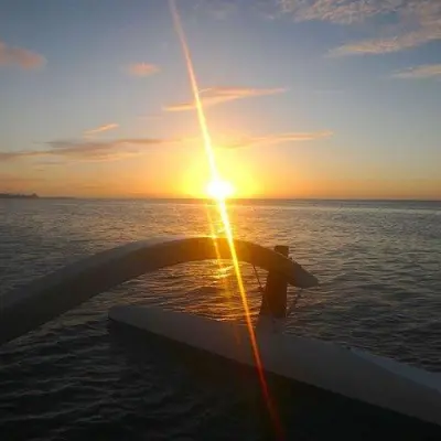 a sunset over a body of water