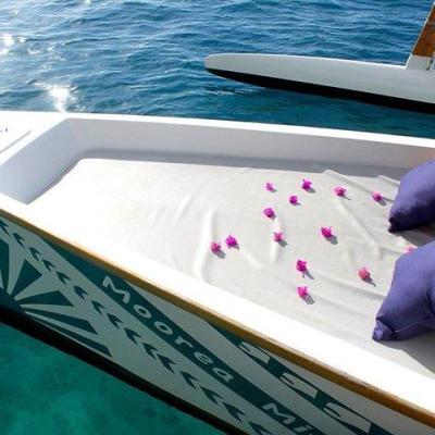 a small boat in a pool of water